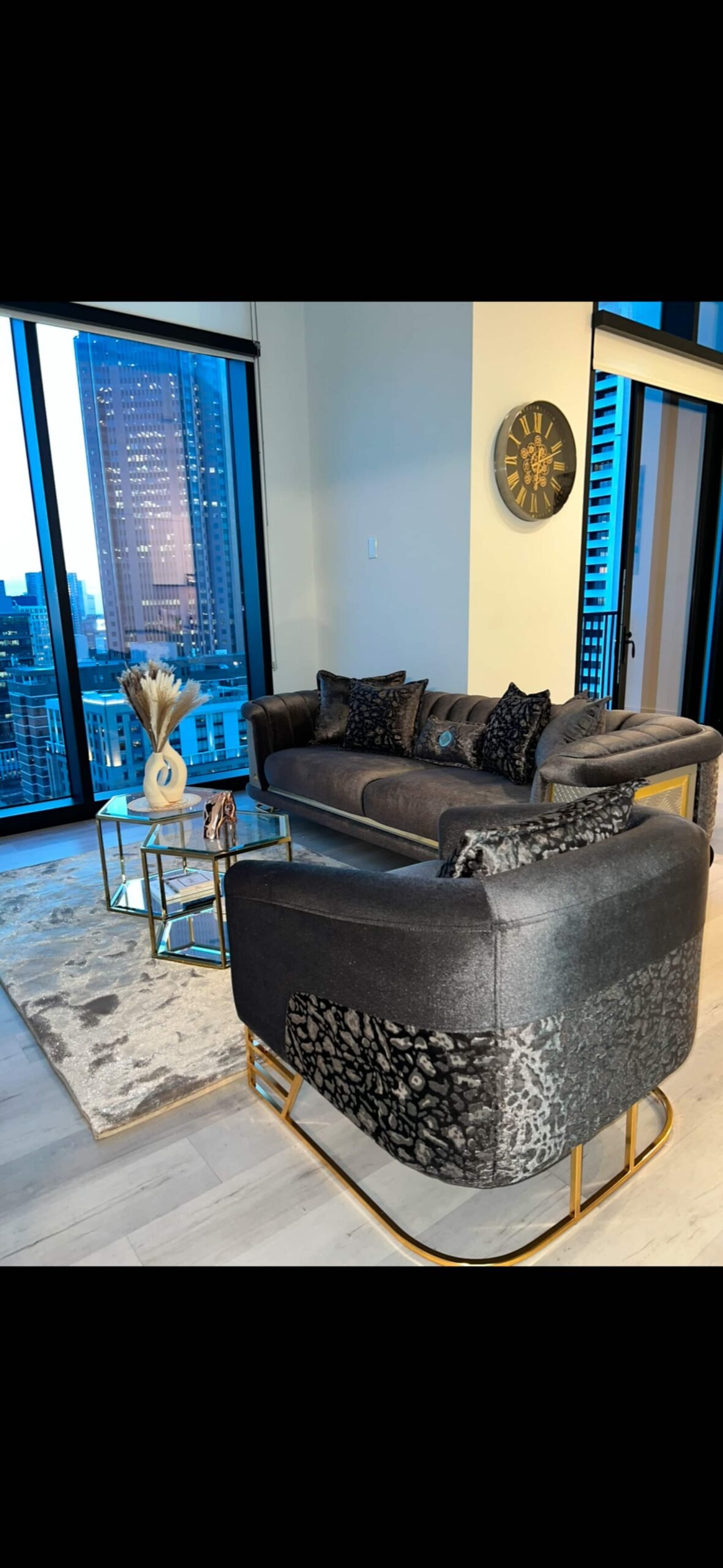 Seating nook framed by floor-to-ceiling windows