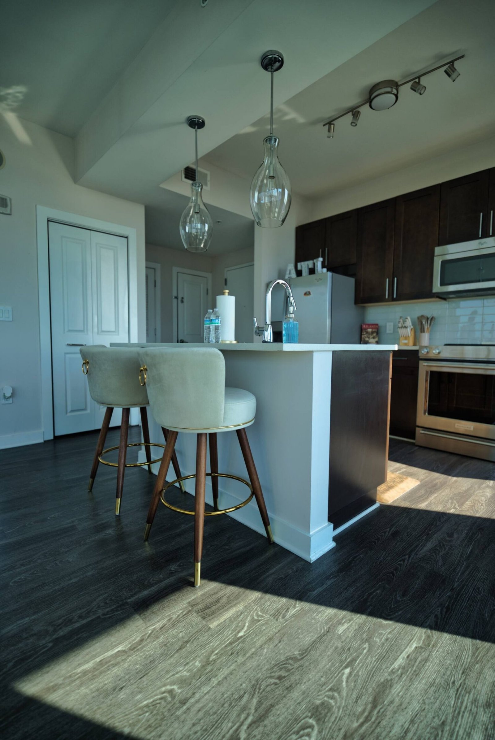 Kitchen with breakfast bar and pendant lighting