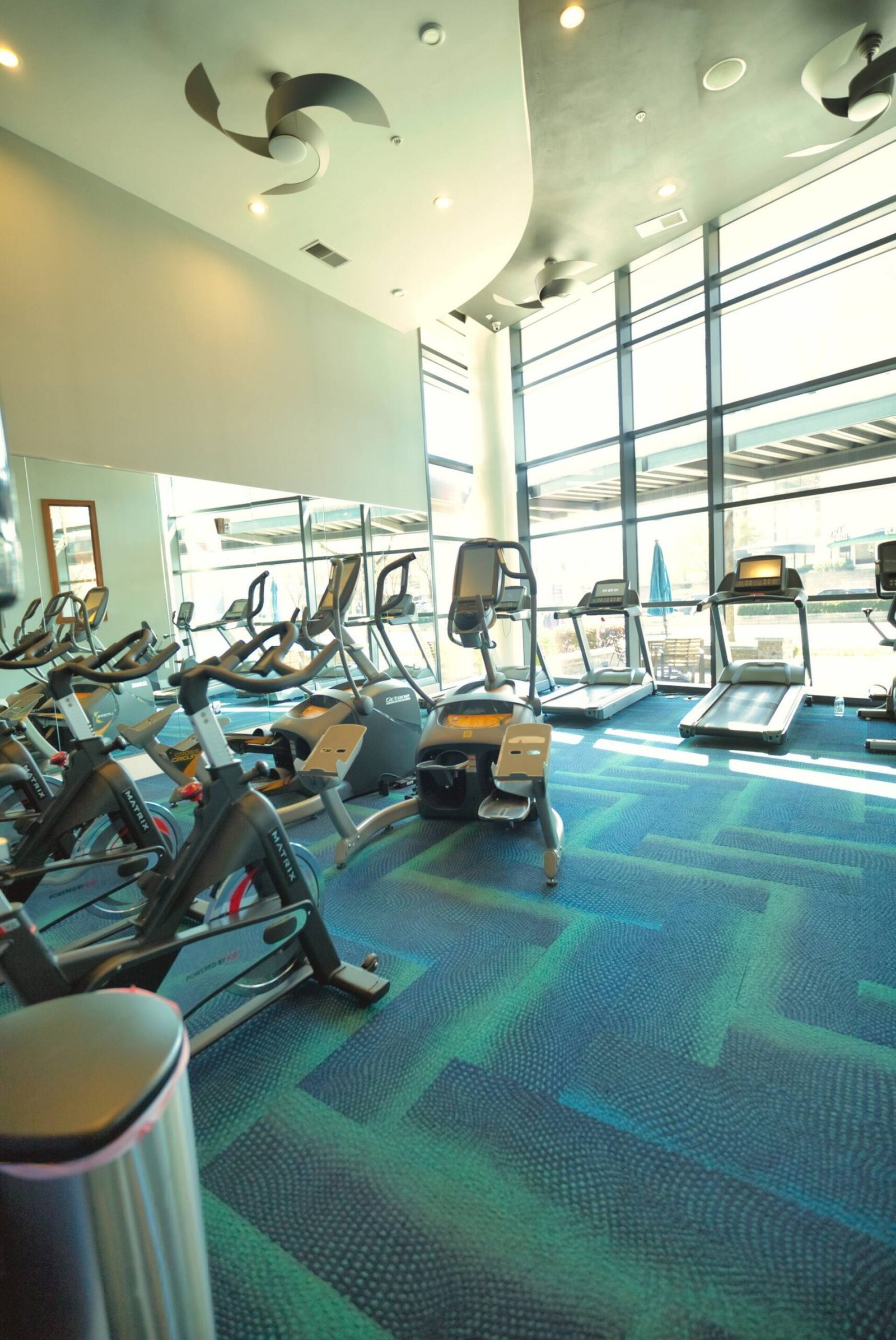 Fitness center with floor-to-ceiling windows